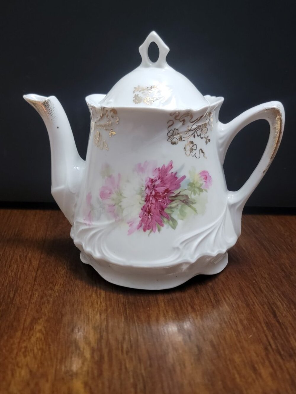Vintage floral porcelain teapot with lid
